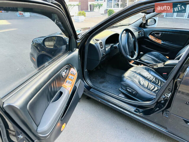 Черный Ниссан Максима, объемом двигателя 2 л и пробегом 197 тыс. км за 5400 $, фото 16 на Automoto.ua