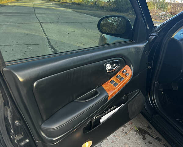 Черный Ниссан Максима, объемом двигателя 2 л и пробегом 300 тыс. км за 3300 $, фото 21 на Automoto.ua