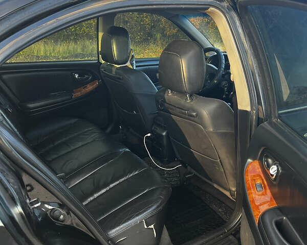 Черный Ниссан Максима, объемом двигателя 2 л и пробегом 300 тыс. км за 3300 $, фото 17 на Automoto.ua