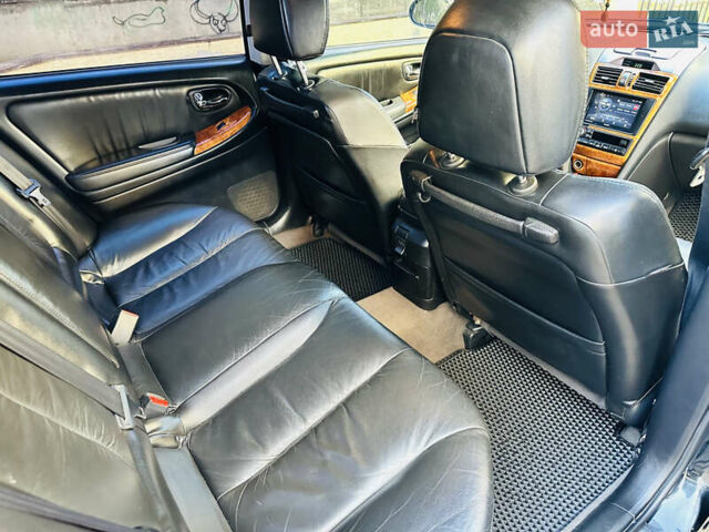 Черный Ниссан Максима, объемом двигателя 2 л и пробегом 197 тыс. км за 5400 $, фото 26 на Automoto.ua