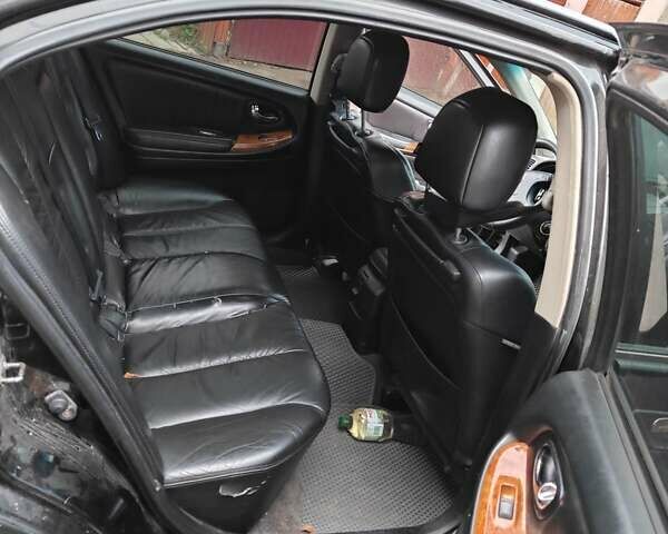 Черный Ниссан Максима, объемом двигателя 3 л и пробегом 320 тыс. км за 3500 $, фото 2 на Automoto.ua