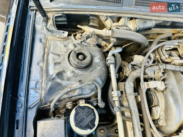 Черный Ниссан Максима, объемом двигателя 2 л и пробегом 197 тыс. км за 5400 $, фото 46 на Automoto.ua