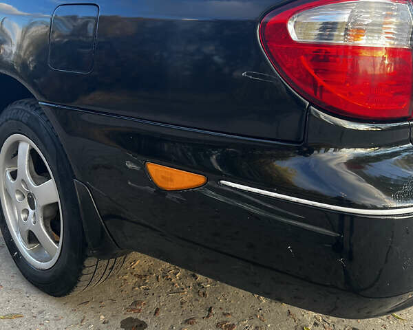 Черный Ниссан Максима, объемом двигателя 2 л и пробегом 300 тыс. км за 3300 $, фото 4 на Automoto.ua