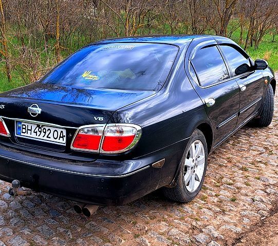 Черный Ниссан Максима, объемом двигателя 2 л и пробегом 390 тыс. км за 3800 $, фото 4 на Automoto.ua