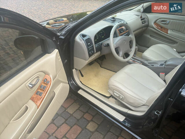Черный Ниссан Максима, объемом двигателя 3 л и пробегом 323 тыс. км за 5799 $, фото 22 на Automoto.ua