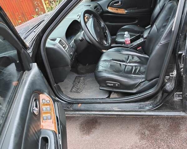 Черный Ниссан Максима, объемом двигателя 3 л и пробегом 320 тыс. км за 3500 $, фото 4 на Automoto.ua