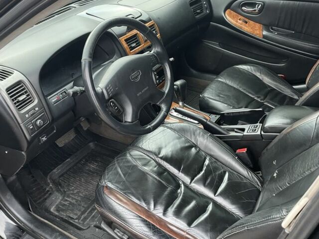 Чорний Ніссан Максіма, об'ємом двигуна 3 л та пробігом 418 тис. км за 2999 $, фото 6 на Automoto.ua