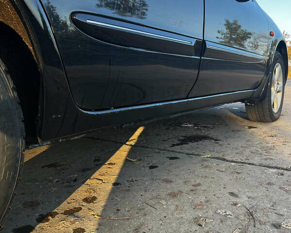 Черный Ниссан Максима, объемом двигателя 2 л и пробегом 300 тыс. км за 3300 $, фото 7 на Automoto.ua