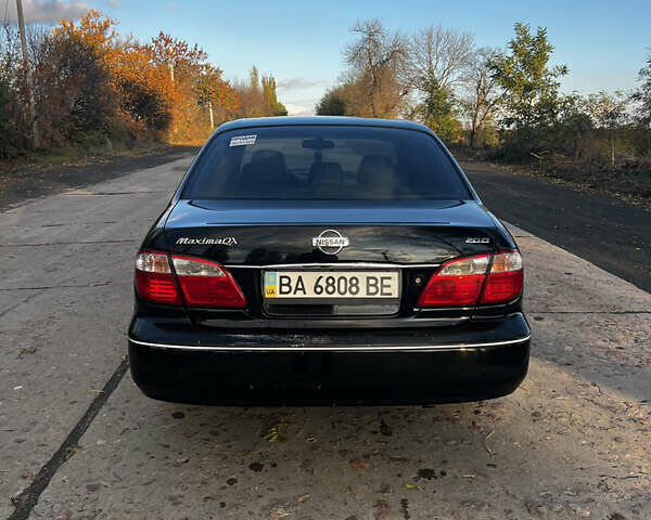 Черный Ниссан Максима, объемом двигателя 2 л и пробегом 300 тыс. км за 3300 $, фото 5 на Automoto.ua
