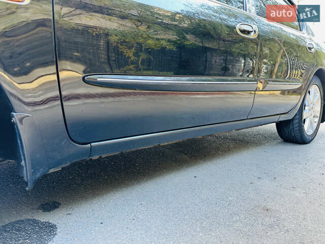 Черный Ниссан Максима, объемом двигателя 2 л и пробегом 197 тыс. км за 5400 $, фото 32 на Automoto.ua