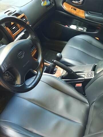 Черный Ниссан Максима, объемом двигателя 2 л и пробегом 335 тыс. км за 3300 $, фото 4 на Automoto.ua