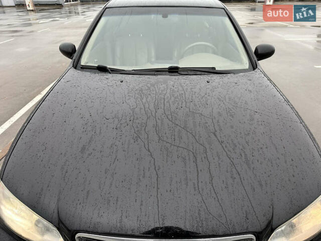 Черный Ниссан Максима, объемом двигателя 3 л и пробегом 465 тыс. км за 5000 $, фото 20 на Automoto.ua