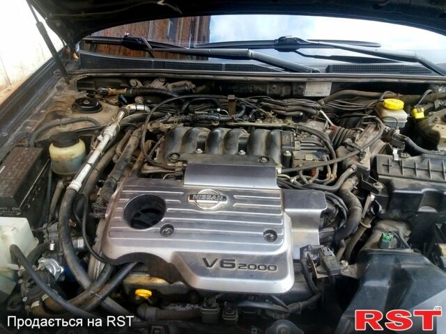 Ніссан Максіма 2004 у Харкові на Automoto.ua Чорний Ніссан Максіма, об'ємом двигуна 2 л та пробігом 233 тис. км за 3550 $, фото 11 на Automoto.ua