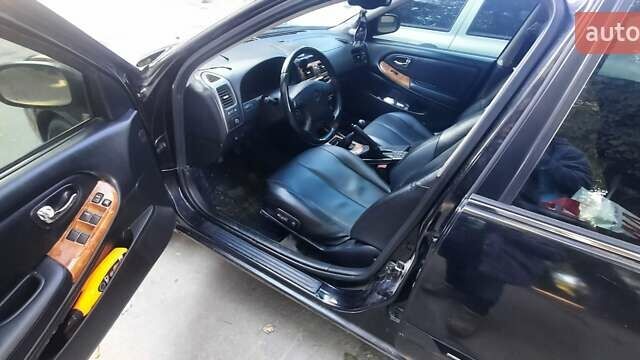 Черный Ниссан Максима, объемом двигателя 2 л и пробегом 335 тыс. км за 3300 $, фото 2 на Automoto.ua