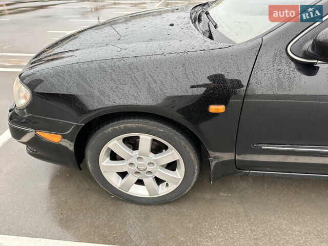 Черный Ниссан Максима, объемом двигателя 3 л и пробегом 465 тыс. км за 5000 $, фото 19 на Automoto.ua