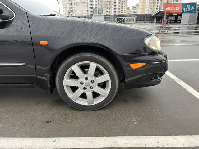 Черный Ниссан Максима, объемом двигателя 3 л и пробегом 465 тыс. км за 5000 $, фото 4 на Automoto.ua