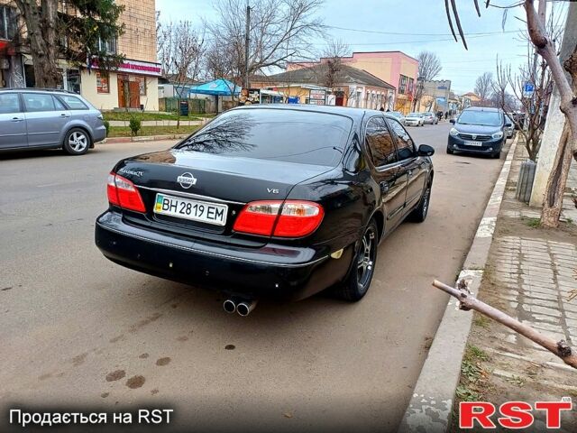 Чорний Ніссан Максіма, об'ємом двигуна 2 л та пробігом 212 тис. км за 4800 $, фото 5 на Automoto.ua