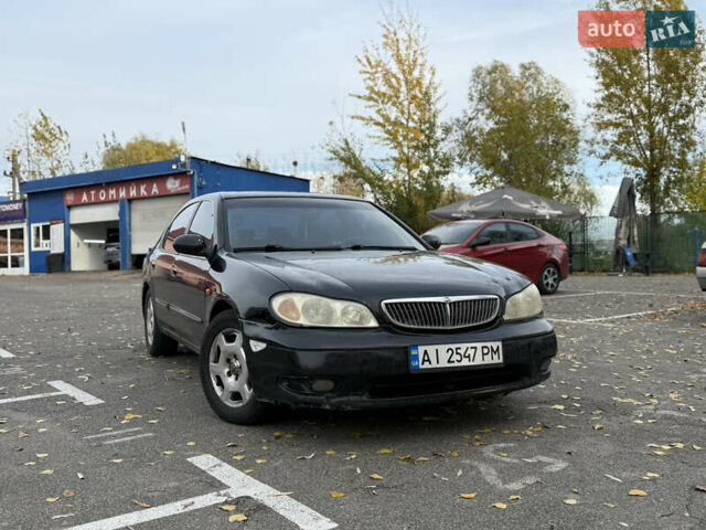 Чорний Ніссан Максіма, об'ємом двигуна 2 л та пробігом 342 тис. км за 2500 $, фото 1 на Automoto.ua