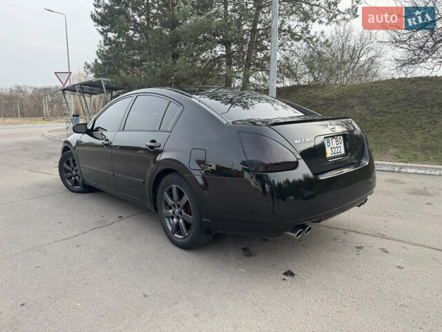 Черный Ниссан Максима, объемом двигателя 3.5 л и пробегом 168 тыс. км за 5900 $, фото 1 на Automoto.ua