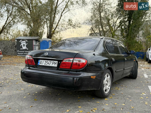 Чорний Ніссан Максіма, об'ємом двигуна 2 л та пробігом 342 тис. км за 2500 $, фото 4 на Automoto.ua