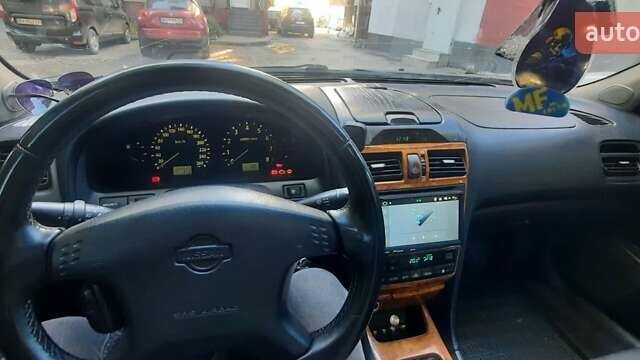 Черный Ниссан Максима, объемом двигателя 2 л и пробегом 335 тыс. км за 3300 $, фото 9 на Automoto.ua