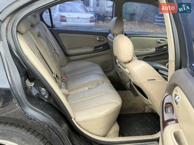 Чорний Ніссан Максіма, об'ємом двигуна 2 л та пробігом 342 тис. км за 2500 $, фото 5 на Automoto.ua