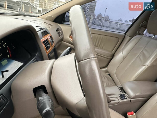 Черный Ниссан Максима, объемом двигателя 3 л и пробегом 465 тыс. км за 5000 $, фото 39 на Automoto.ua