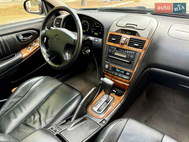 Ниссан Максима 2004 в Днепре (Днепропетровске) на Automoto.ua Черный Ниссан Максима, объемом двигателя 2 л и пробегом 92 тыс. км за 5900 $, фото 42 на Automoto.ua