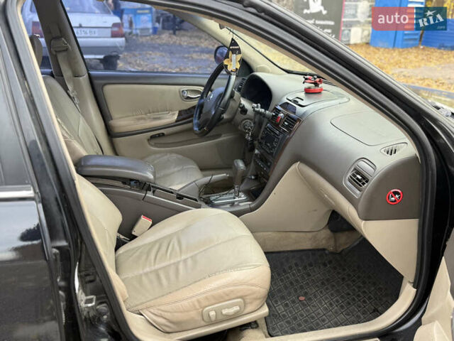 Чорний Ніссан Максіма, об'ємом двигуна 2 л та пробігом 342 тис. км за 2500 $, фото 6 на Automoto.ua