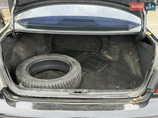 Черный Ниссан Максима, объемом двигателя 2 л и пробегом 342 тыс. км за 2500 $, фото 9 на Automoto.ua