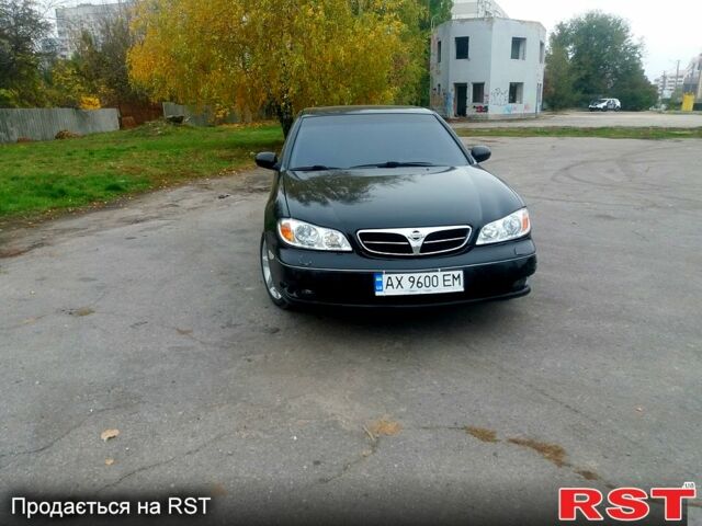 Ніссан Максіма 2004 у Харкові на Automoto.ua Чорний Ніссан Максіма, об'ємом двигуна 2 л та пробігом 233 тис. км за 3550 $, фото 1 на Automoto.ua