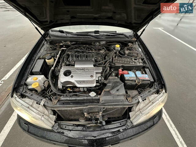 Черный Ниссан Максима, объемом двигателя 3 л и пробегом 465 тыс. км за 5000 $, фото 46 на Automoto.ua