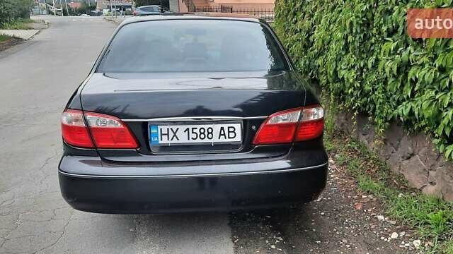 Черный Ниссан Максима, объемом двигателя 2 л и пробегом 335 тыс. км за 3300 $, фото 1 на Automoto.ua