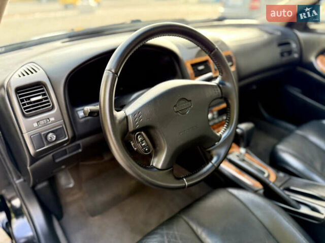 Ниссан Максима 2004 в Днепре (Днепропетровске) на Automoto.ua Черный Ниссан Максима, объемом двигателя 2 л и пробегом 92 тыс. км за 5900 $, фото 23 на Automoto.ua