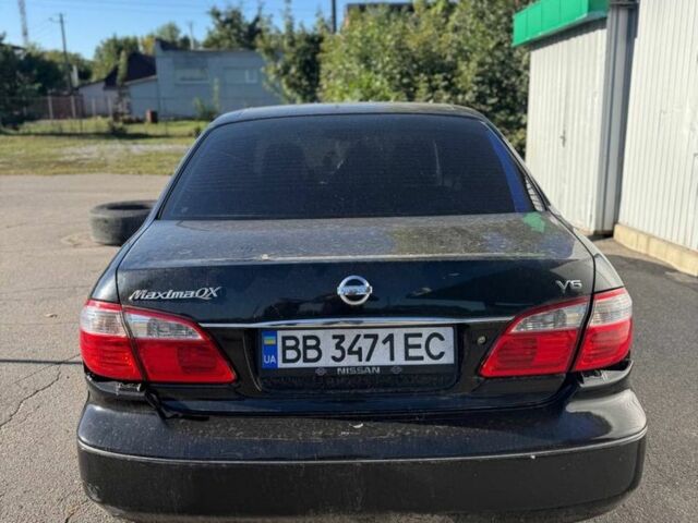 Чорний Ніссан Максіма, об'ємом двигуна 2 л та пробігом 300 тис. км за 1650 $, фото 2 на Automoto.ua