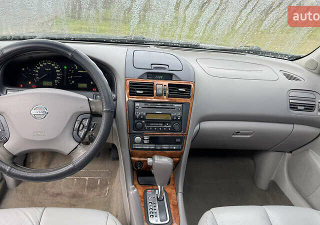 Черный Ниссан Максима, объемом двигателя 2.99 л и пробегом 340 тыс. км за 3999 $, фото 12 на Automoto.ua