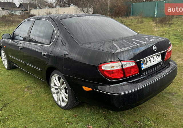 Черный Ниссан Максима, объемом двигателя 2.99 л и пробегом 340 тыс. км за 3999 $, фото 6 на Automoto.ua