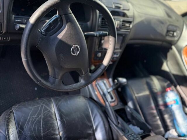 Чорний Ніссан Максіма, об'ємом двигуна 2 л та пробігом 300 тис. км за 1650 $, фото 4 на Automoto.ua