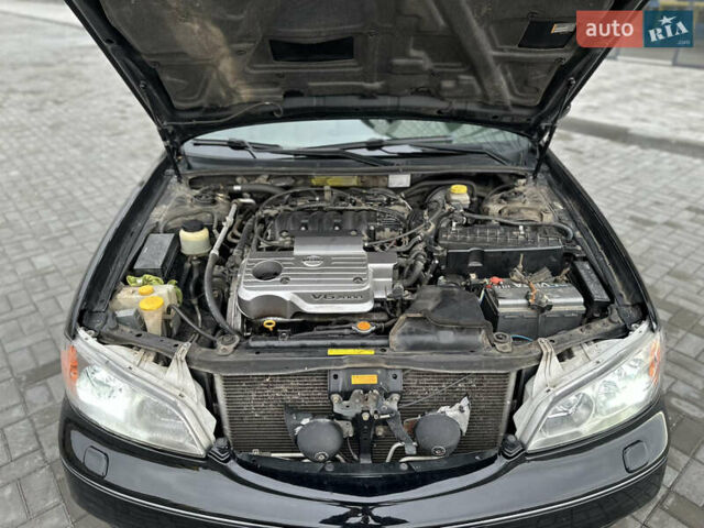 Черный Ниссан Максима, объемом двигателя 2 л и пробегом 221 тыс. км за 4800 $, фото 25 на Automoto.ua
