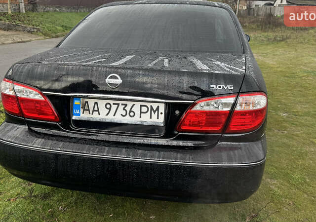 Черный Ниссан Максима, объемом двигателя 2.99 л и пробегом 340 тыс. км за 3999 $, фото 5 на Automoto.ua