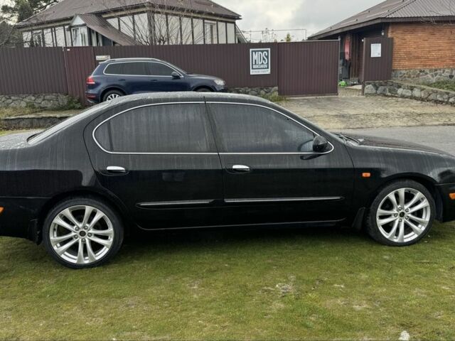 Чорний Ніссан Максіма, об'ємом двигуна 3 л та пробігом 340 тис. км за 4000 $, фото 3 на Automoto.ua