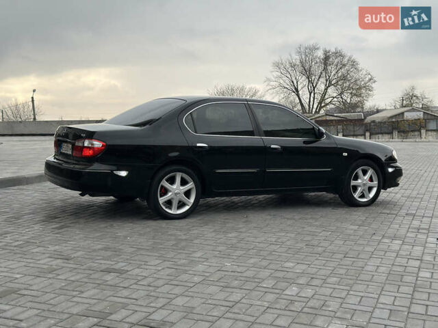 Черный Ниссан Максима, объемом двигателя 2 л и пробегом 221 тыс. км за 4800 $, фото 1 на Automoto.ua