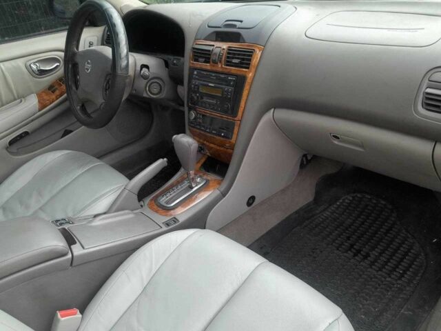 Черный Ниссан Максима, объемом двигателя 3 л и пробегом 343 тыс. км за 3200 $, фото 3 на Automoto.ua