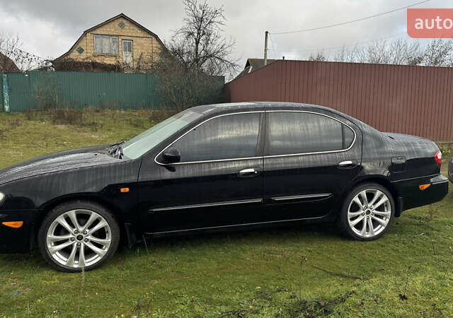 Черный Ниссан Максима, объемом двигателя 2.99 л и пробегом 340 тыс. км за 3999 $, фото 7 на Automoto.ua