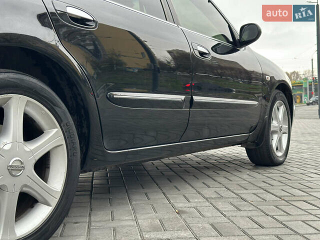 Черный Ниссан Максима, объемом двигателя 2 л и пробегом 221 тыс. км за 4800 $, фото 9 на Automoto.ua