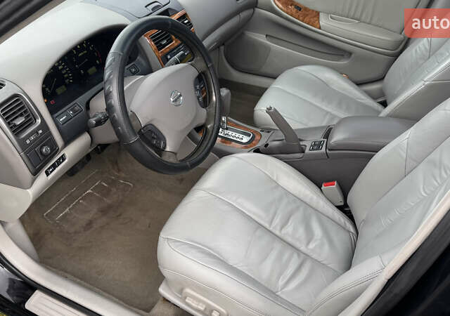 Черный Ниссан Максима, объемом двигателя 2.99 л и пробегом 340 тыс. км за 3999 $, фото 9 на Automoto.ua