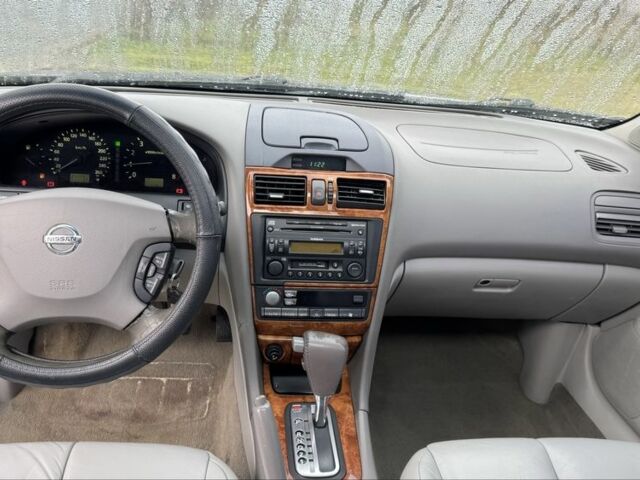 Чорний Ніссан Максіма, об'ємом двигуна 3 л та пробігом 340 тис. км за 4000 $, фото 10 на Automoto.ua