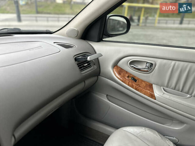 Черный Ниссан Максима, объемом двигателя 2 л и пробегом 221 тыс. км за 4800 $, фото 21 на Automoto.ua