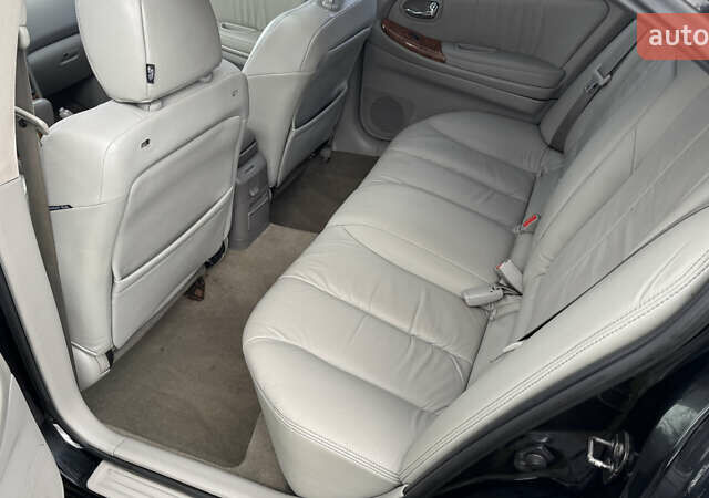 Черный Ниссан Максима, объемом двигателя 2.99 л и пробегом 340 тыс. км за 3999 $, фото 11 на Automoto.ua