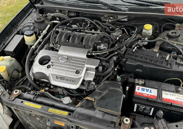 Черный Ниссан Максима, объемом двигателя 2.99 л и пробегом 340 тыс. км за 3999 $, фото 14 на Automoto.ua